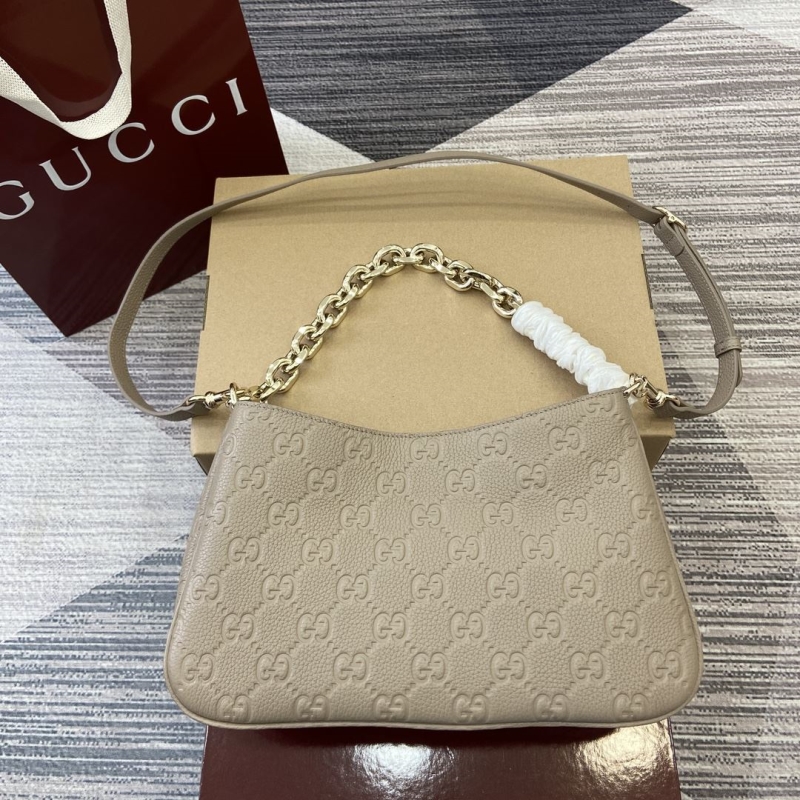 G*u*i top handle bags